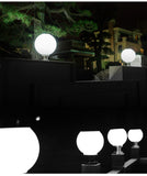 Solar Pillar Light Round Ball Stainless Steel Base Night Scene.